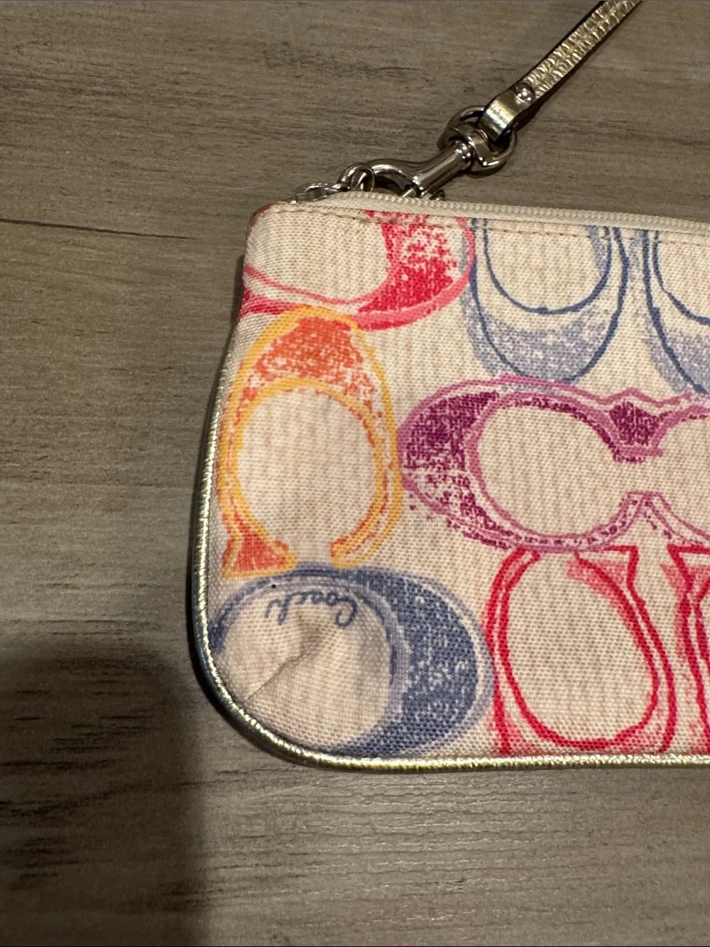 Coach Multicolor Signature Wristlet with Pink, Purple, Blue & Yellow Accents